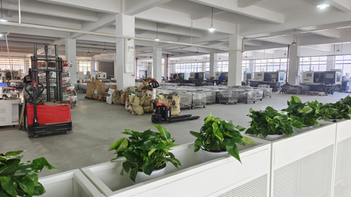 Modern manufacturing facility interior, industrial equipment, clean factory floor, professional industrial photography